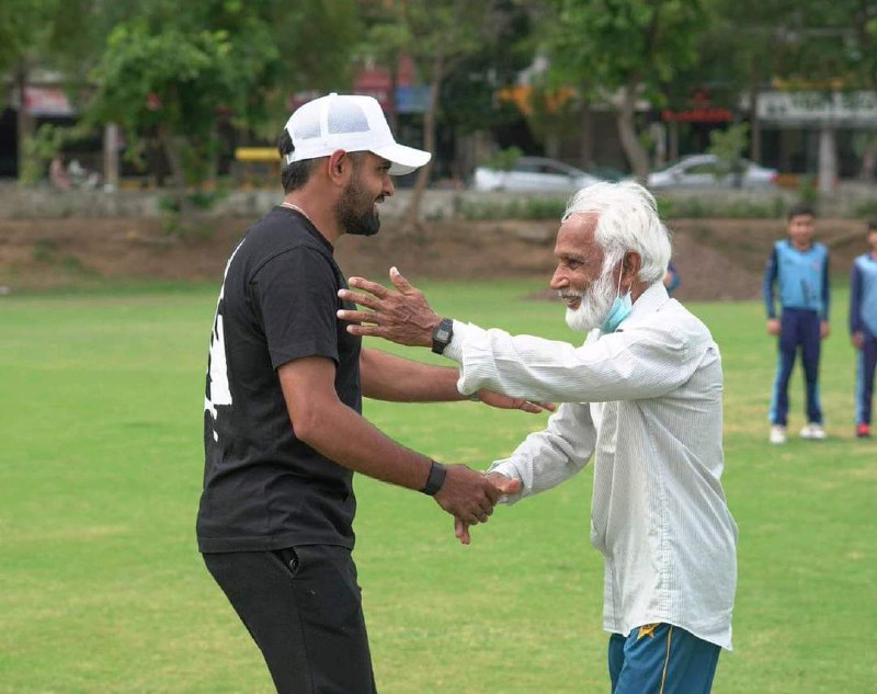 Babar Azam with Azhar Ali father. …