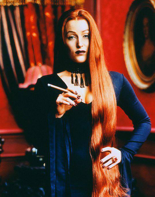 cr: Gillian Anderson dressed as Morticia …