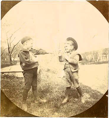 Two boys playing at boxing, Nova …