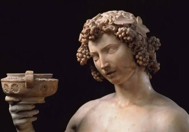 (*Скульптура Микеланджело, который изображает выпившего бога …
