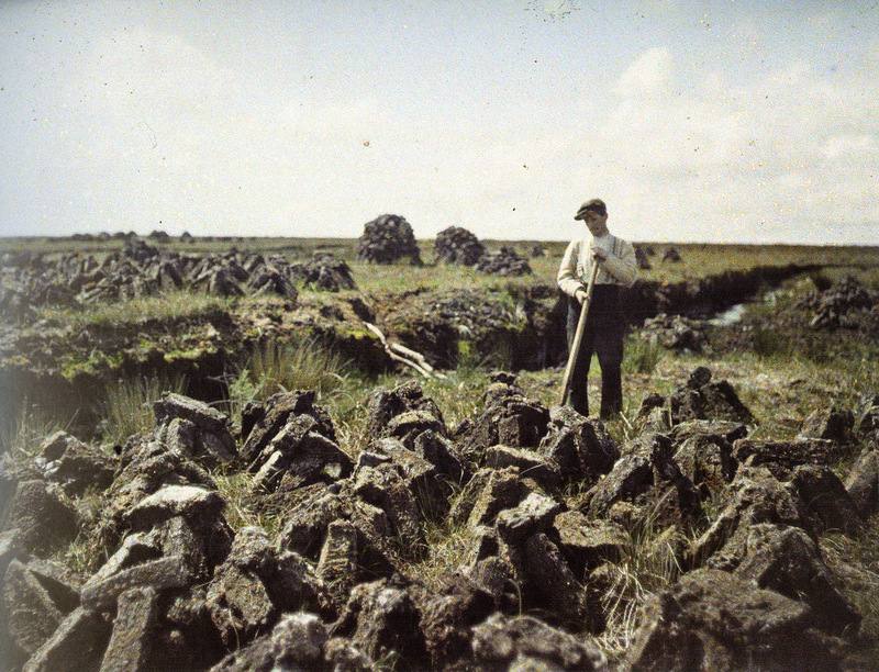 Man cutting turf, South Connemara, Ireland, …