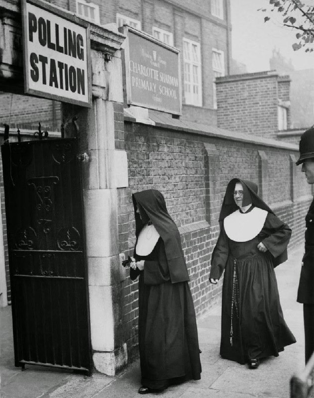 Nuns entering a polling station, UK, …