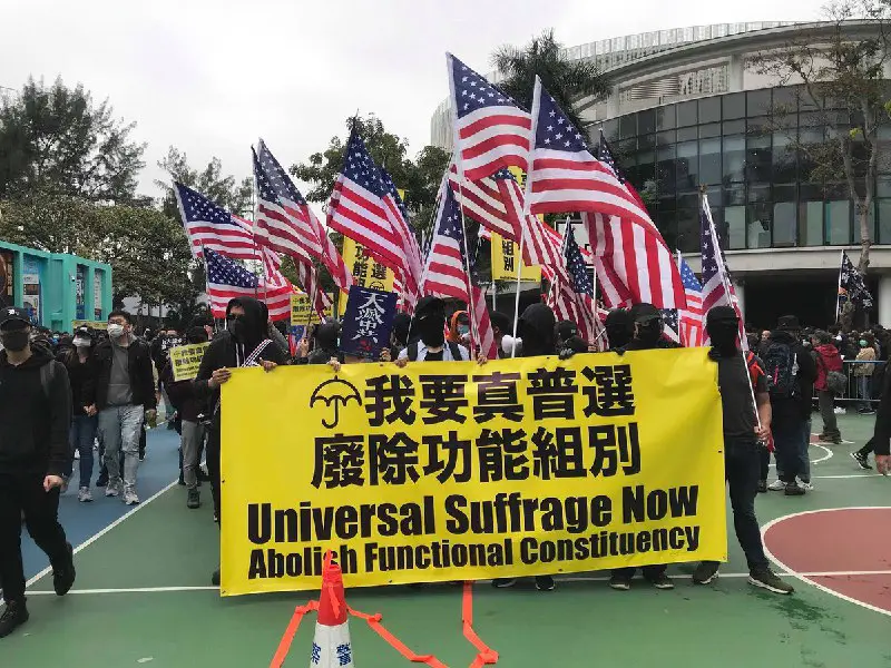 Hong Kongers raised US flags and stress the importance of universal suffrage. Say no to functional constituency! Say no to …