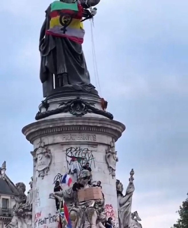 LGBTQ and Palestinian flags, communist fist, …