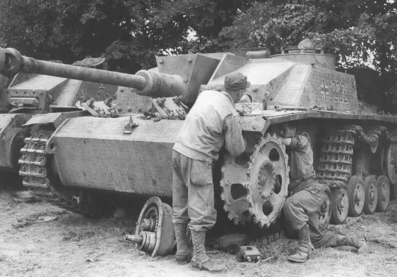 U.S. technicians repairing a German StuG …