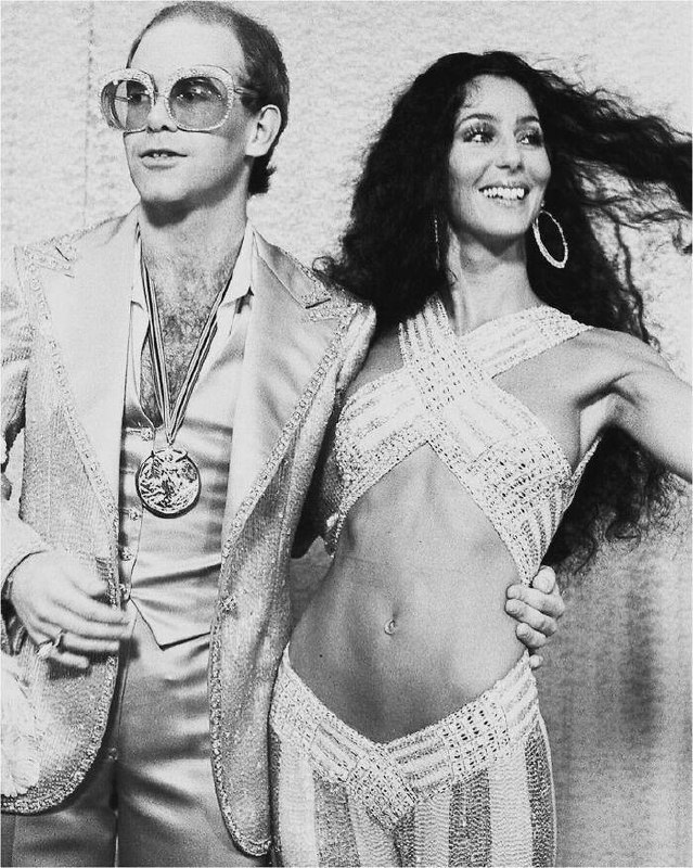 **Cher and Elton John, 1975.**